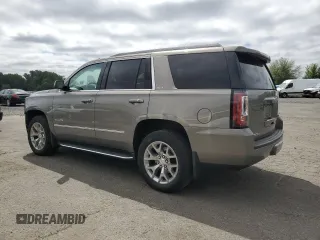 2019 GMC Yukon SLT with VIN 1GKS2BKC4KR272138, listed as a Copart auction lot 61168384 with 92,321 mi miles and Salvage Title. Bid and sale history available at carsss.com. Image 2.