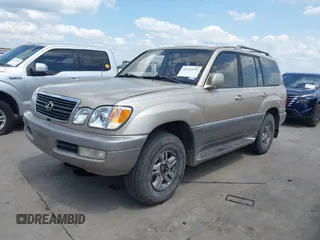 2001 Lexus LX 470 with VIN JTJHT00W713511796, listed as a IAAI auction lot 42222574 with 297,427 mi miles and . Bid and sale history available at carsss.com. Image 17.