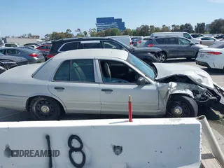 2008 Ford Police Interceptor with VIN 2FAFP71V88X150434, listed as a IAAI auction lot 42283744 with Not provided miles and . Bid and sale history available at DreamBid. Image 13.