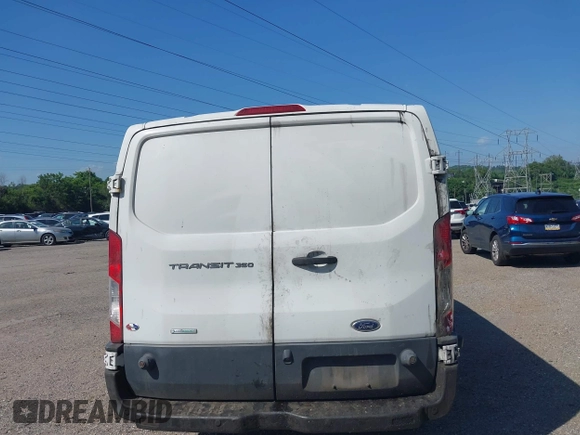2016 Ford Transit Cargo z VIN 1FTBW2YG0GKB07293, wystawiony jako IAAI lot #42577905 z przebiegiem 155 324 mil mil oraz . Historia ofert i sprzedaży dostępna na DreamBid. Obrazek 17.