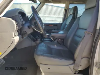 2002 Land Rover Discovery with VIN SALTW12412A748747, listed as a Copart auction lot 47189965 with 130,237 mi miles and Salvage Title. Bid and sale history available at DreamBid. Image 7.