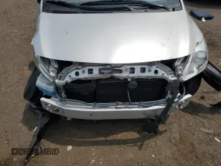 2012 Toyota Yaris z VIN JTDBT4K38C1414236, wystawiony jako Copart lot #58471515 z przebiegiem Nie podano mil oraz Szkoda całkowita • Salvage title. Historia ofert i sprzedaży dostępna na DreamBid. Obrazek 11.