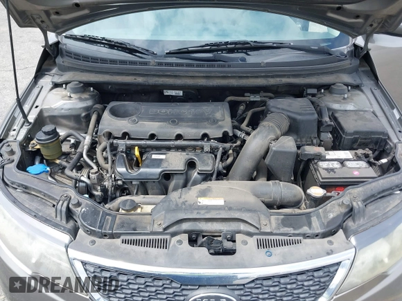 2012 Kia Forte EX with VIN KNAFU4A2XC5560585, listed as a IAAI auction lot 42121133 with 151,079 mi miles. Bid and sale history available at carsss.com. Image 10.