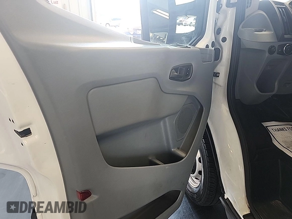 2016 Ford Transit Cargo with VIN 1FTYE1ZM0GKB06690, listed as a IAAI auction lot 42677893 with 295,974 mi miles and . Bid and sale history available at DreamBid. Image 12.