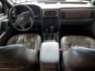 2001 Jeep Grand Cherokee Laredo z VIN 1J4GW48S11C609344, wystawiony jako Copart lot #59258245 z przebiegiem 162 141 mil mil oraz Szkoda całkowita • Salvage title. Historia ofert i sprzedaży dostępna na DreamBid. Obrazek 8.