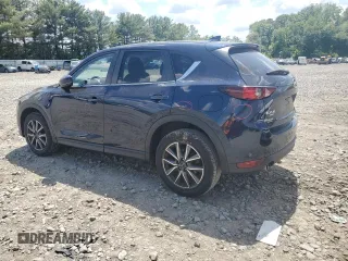 2018 Mazda CX-5 Touring with VIN JM3KFBCMXJ0460020, listed as a Copart auction lot 55997305 with 56,361 mi miles and Salvage Title. Bid and sale history available at DreamBid. Image 2.