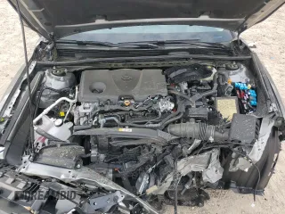 2025 Toyota Camry LE with VIN 4T1DAACKXSU556874, listed as a Copart auction lot 52694525 with 7,076 mi miles and Salvage Title. Bid and sale history available at carsss.com. Image 11.