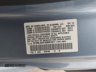 2014 Honda Odyssey Touring with VIN 5FNRL5H91EB081811, listed as a IAAI auction lot 42153920 with 16 mi miles and . Bid and sale history available at DreamBid. Image 9.