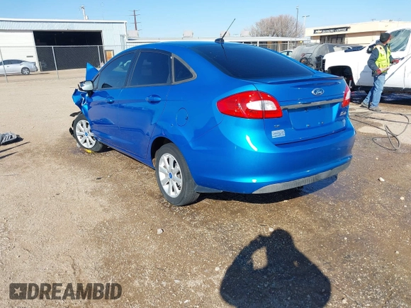 2012 Ford Fiesta SE with VIN 3FADP4BJ2CM115295, listed as a IAAI auction lot 41609949 with Not Provided miles. Bid and sale history available at carsss.com. Image 3.