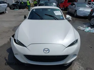 2023 Mazda MX-5 Miata Grand Touring с VIN JM1NDAM71P0560062, выставлен на аукционе IAAI как лот 42065123 с пробегом 11 320 миль миль и . История ставок и продаж доступна на DreamBid. Изображение 12.