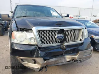 2004 Ford F-150 XLT with VIN 1FTPW14554KC93459, listed as a IAAI auction lot 41673091 with 239,519 mi miles. Bid and sale history available at carsss.com. Image 6.