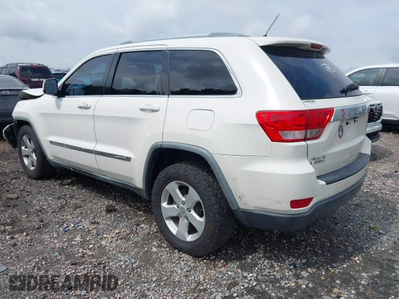 2011 Jeep Grand Cherokee Laredo with VIN 1J4RR4GG7BC701007, listed as a IAAI auction lot 42704995 with 145,956 mi miles and . Bid and sale history available at DreamBid. Image 3.