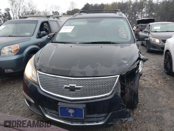 2013 Chevrolet Traverse LT with VIN 1GNKVJKD9DJ124307, listed as a IAAI auction lot 41864010 with 123,458 mi miles and . Bid and sale history available at DreamBid. Image 12.