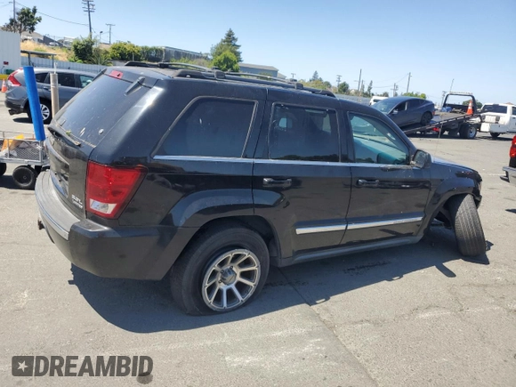 2005 Jeep Grand Cherokee Limited with VIN 1J8HR58265C699077, listed as a Copart auction lot 58490185 with 163,280 mi miles and Salvage title. Bid and sale history available at DreamBid. Image 3.