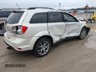 2013 Dodge Journey R/T with VIN 3C4PDDEG0DT651153, listed as a IAAI auction lot 41724885 with 133,391 mi miles and . Bid and sale history available at DreamBid. Image 4.