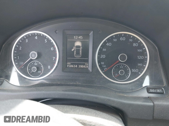 2012 Volkswagen Tiguan LE z VIN WVGAV7AX5CW097459, wystawiony jako IAAI lot #42526659 z przebiegiem 158 634 mil mil oraz . Historia ofert i sprzedaży dostępna na DreamBid. Obrazek 7.