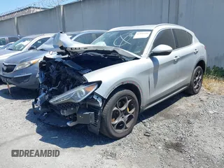 2018 Alfa Romeo Stelvio z VIN ZASFAKAN1J7B89142, wystawiony jako IAAI lot #42192248 z przebiegiem Nie podano mil oraz . Historia ofert i sprzedaży dostępna na DreamBid. Obrazek 23.