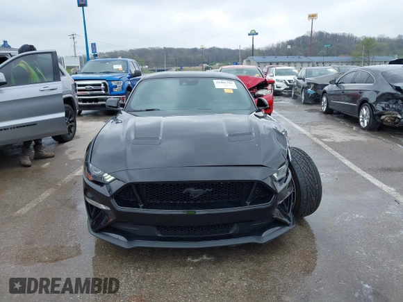 2021 Ford Mustang GT z VIN 1FA6P8CF2M5149643, wystawiony jako IAAI lot #41981794 z przebiegiem 57 345 mil mil oraz . Historia ofert i sprzedaży dostępna na DreamBid. Obrazek 12.