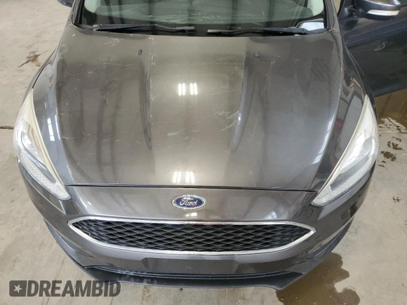 2017 Ford Focus SE with VIN 1FADP3F24HL260795, listed as a Copart auction lot 46895775 with Not provided miles and Salvage title. Bid and sale history available at DreamBid. Image 11.