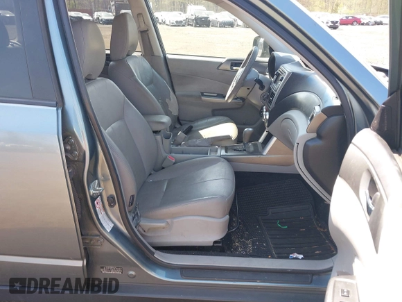 2011 Subaru Forester X Limited with VIN JF2SHAEC9BH713866, listed as a IAAI auction lot 42114557 with 148,404 mi miles and . Bid and sale history available at DreamBid. Image 5.