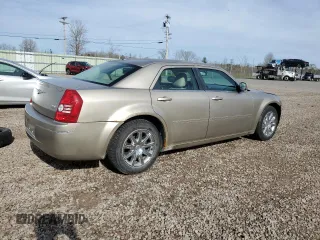 2009 Chrysler 300 Touring with VIN 2C3LA53V89H565107, listed as a Copart auction lot 54717035 with Not Provided miles and Clean Title. Bid and sale history available at carsss.com. Image 3.