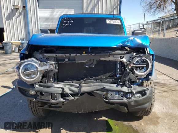 2024 Ford Bronco Big Bend z VIN 1FMDE7BH9RLB50114, wystawiony jako Copart lot #52157635 z przebiegiem 1 002 mil mil oraz Szkoda całkowita • Salvage title. Historia ofert i sprzedaży dostępna na DreamBid. Obrazek 5.