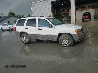 2004 Jeep Grand Cherokee Laredo z VIN 1J4GW48S74C165732, wystawiony jako Copart lot #56316885 z przebiegiem 177 139 mil mil oraz Szkoda całkowita • Salvage title. Historia ofert i sprzedaży dostępna na DreamBid. Obrazek 15.