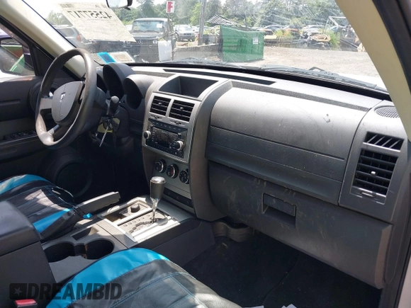 2009 Dodge Nitro SE with VIN 1D8GU28K49W530813, listed as a IAAI auction lot 42557717 with 125,772 mi miles and . Bid and sale history available at DreamBid. Image 5.
