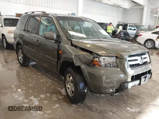 2006 Honda Pilot EX-L with VIN 5FNYF187X6B026463, listed as a IAAI auction lot 41612181 with 242,828 mi miles and . Bid and sale history available at DreamBid. Image 1.