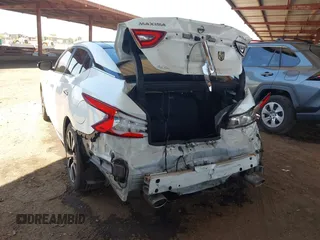 2016 Nissan Maxima SR z VIN 1N4AA6AP8GC417901, wystawiony jako IAAI lot #42328746 z przebiegiem 190 586 mil mil oraz . Historia ofert i sprzedaży dostępna na DreamBid. Obrazek 3.