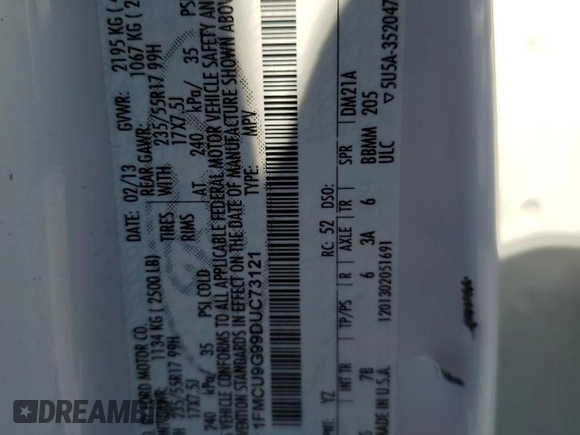 2013 Ford Escape SE z VIN 1FMCU9G99DUC73121, wystawiony jako Copart lot #57966605 z przebiegiem 169 764 mil mil oraz Szkoda całkowita • Salvage title. Historia ofert i sprzedaży dostępna na DreamBid. Obrazek 14.