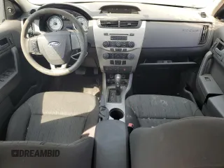 2009 Ford Focus SE with VIN 1FAHP35N69W173977, listed as a Copart auction lot 69018554 with 138,496 mi miles and Salvage Title. Bid and sale history available at carsss.com. Image 8.