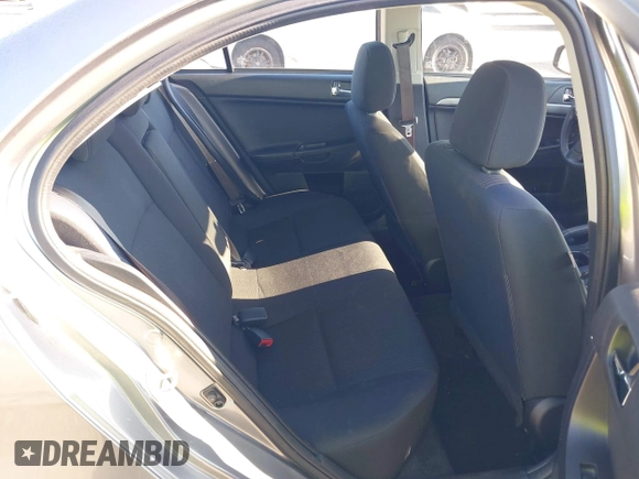 2015 Mitsubishi Lancer SE with VIN JA32V2FWXFU023626, listed as a IAAI auction lot 42012381 with 143,981 mi miles. Bid and sale history available at carsss.com. Image 8.