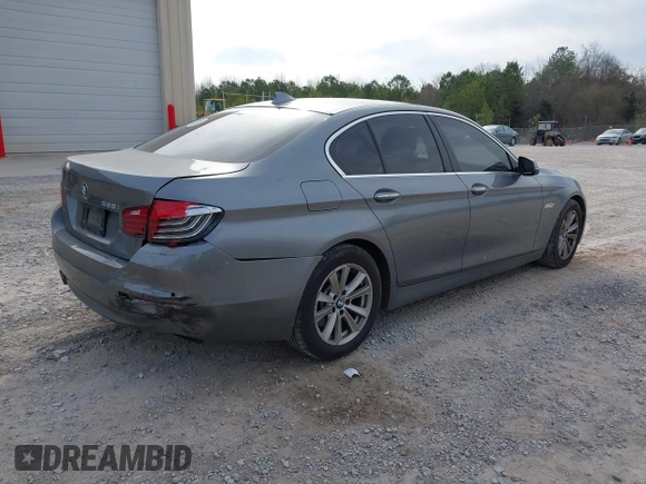 2014 BMW 5 Series 528i xDrive with VIN WBA5A7C58ED617016, listed as a IAAI auction lot 41696157 with 184,365 mi miles and . Bid and sale history available at DreamBid. Image 4.