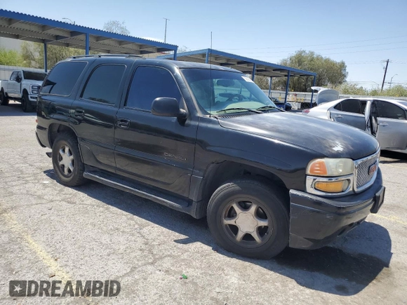 2002 GMC Yukon Denali z VIN 1GKEK63U62J241161, wystawiony jako Copart lot #58350085 z przebiegiem Nie podano mil oraz Szkoda całkowita • Salvage title. Historia ofert i sprzedaży dostępna na DreamBid. Obrazek 4.