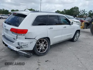 2014 Jeep Grand Cherokee Summit z VIN 1C4RJEJG1EC357948, wystawiony jako IAAI lot #42498652 z przebiegiem 213 715 mil mil oraz . Historia ofert i sprzedaży dostępna na DreamBid. Obrazek 4.
