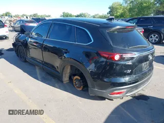 2018 Mazda CX-9 Sport with VIN JM3TCBBY6J0222750, listed as a IAAI auction lot 42294464 with 63,927 mi miles and . Bid and sale history available at DreamBid. Image 3.