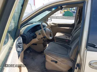 1999 Plymouth Voyager Grand SE z VIN 1P4GP44G0XB613853, wystawiony jako IAAI lot #42064199 z przebiegiem 175 050 mil mil oraz . Historia ofert i sprzedaży dostępna na DreamBid. Obrazek 5.