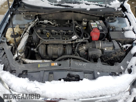 2012 Ford Fusion SEL z VIN 3FAHP0JA7CR300456, wystawiony jako Copart lot #44750125 z przebiegiem 144 788 mil mil oraz Szkoda całkowita • Salvage title. Historia ofert i sprzedaży dostępna na DreamBid. Obrazek 13.