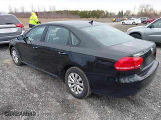 2014 Volkswagen Passat Wolfsburg Ed with VIN 1VWAT7A31EC098634, listed as a IAAI auction lot 41924146 with 80,872 mi miles. Bid and sale history available at carsss.com. Image 3.