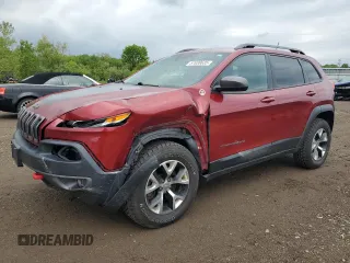 2014 Jeep Cherokee Trailhawk z VIN 1C4PJMBS2EW130125, wystawiony jako Copart lot #57830635 z przebiegiem 117 811 mil mil oraz Szkody całkowita. Historia ofert i sprzedaży dostępna na DreamBid. Obrazek 1.