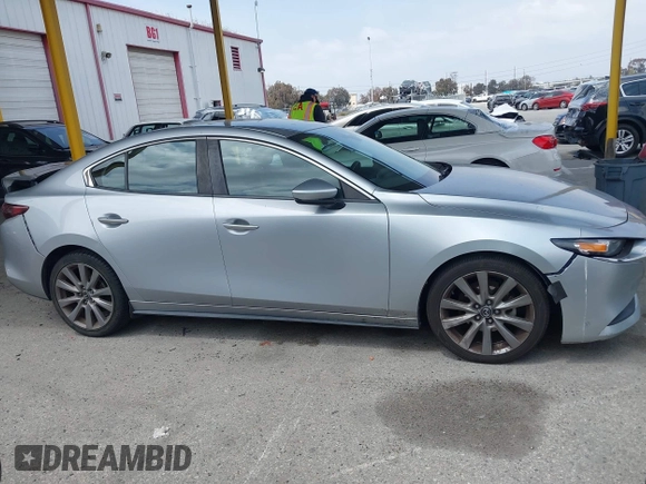 2020 Mazda 3 Select with VIN 3MZBPACL6LM131481, listed as a IAAI auction lot 42118795 with 104,102 mi miles and . Bid and sale history available at DreamBid. Image 13.