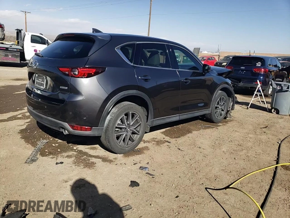 2018 Mazda CX-5 Grand Touring with VIN JM3KFADMXJ1323646, listed as a Copart auction lot 46857825 with 62,262 mi miles and Salvage title. Bid and sale history available at DreamBid. Image 15.