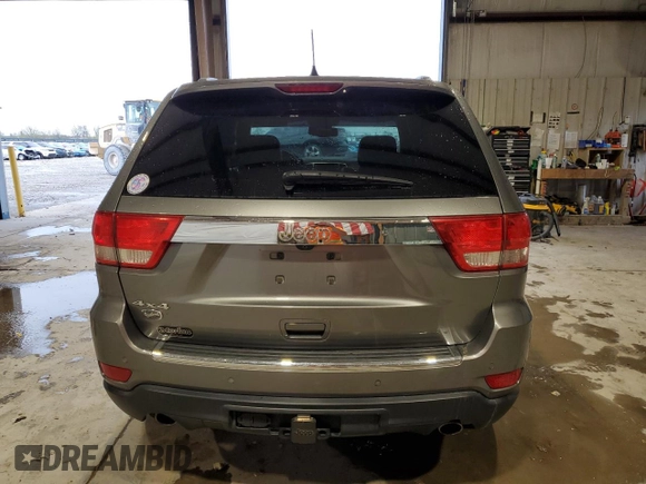 2013 Jeep Grand Cherokee Overland with VIN 1C4RJFCT5DC599866, listed as a Copart auction lot 51837395 with 105,521 mi miles and Salvage Title. Bid and sale history available at carsss.com. Image 6.