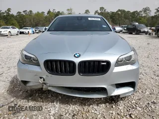 2013 BMW M5 z VIN WBSFV9C53DD096706, wystawiony jako Copart lot #48576395 z przebiegiem 119 538 mil mil oraz Szkoda całkowita • Salvage title. Historia ofert i sprzedaży dostępna na DreamBid. Obrazek 5.