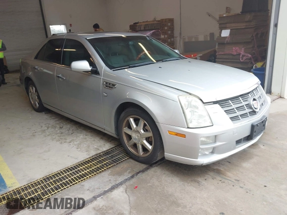 2011 Cadillac STS RWD with VIN 1G6DW6ED4B0120517, listed as a IAAI auction lot 41765069 with 120,059 mi miles and . Bid and sale history available at DreamBid. Image 1.