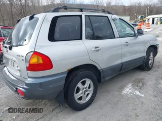 2002 Hyundai Santa Fe GLS with VIN KM8SC73D82U275582, listed as a IAAI auction lot 41565218 with 248,804 mi miles. Bid and sale history available at carsss.com. Image 4.