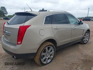 2010 Cadillac SRX Performance Collection with VIN 3GYFNBEY3AS640701, listed as a IAAI auction lot 41952936 with 147,437 mi miles. Bid and sale history available at carsss.com. Image 4.