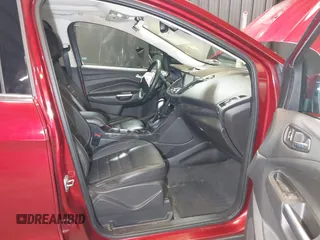 2014 Ford Escape Titanium with VIN 1FMCU9J9XEUD69589, listed as a IAAI auction lot 42031882 with 123,632 mi miles and . Bid and sale history available at DreamBid. Image 5.