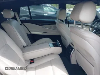 2014 BMW 5 Series 535i Gran Turismo xDrive with VIN WBA5M4C52ED183844, listed as a IAAI auction lot 42227214 with 104,098 mi miles and . Bid and sale history available at DreamBid. Image 8.